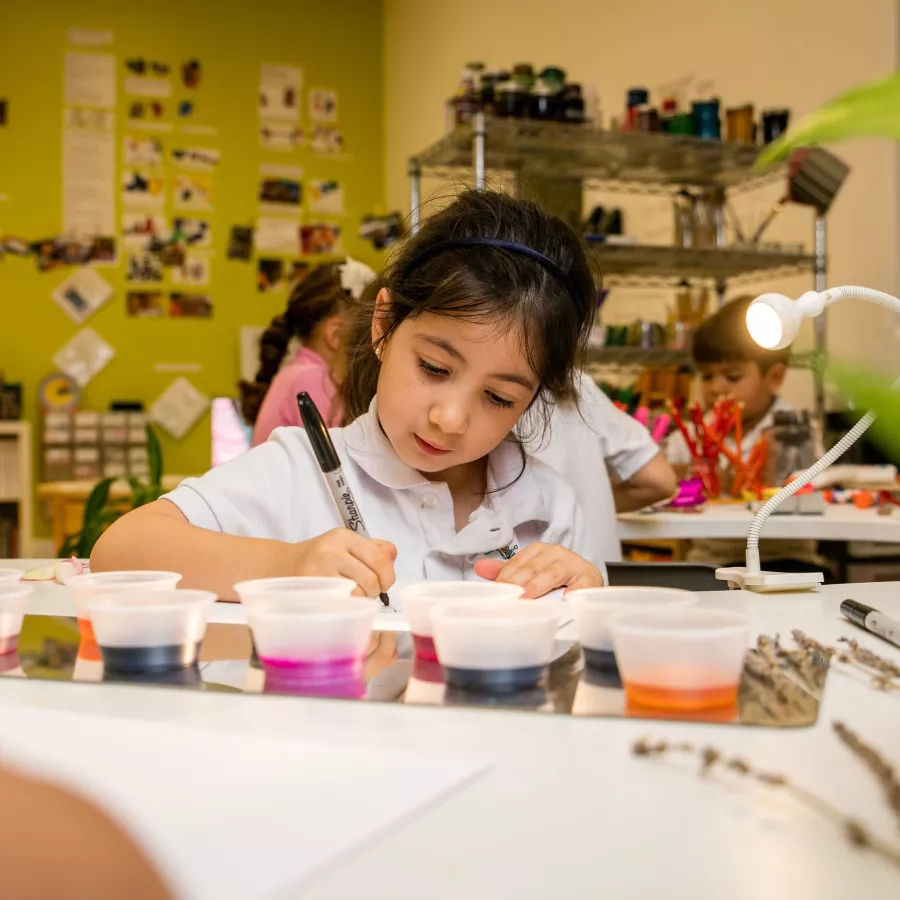 Preschool girl drawing