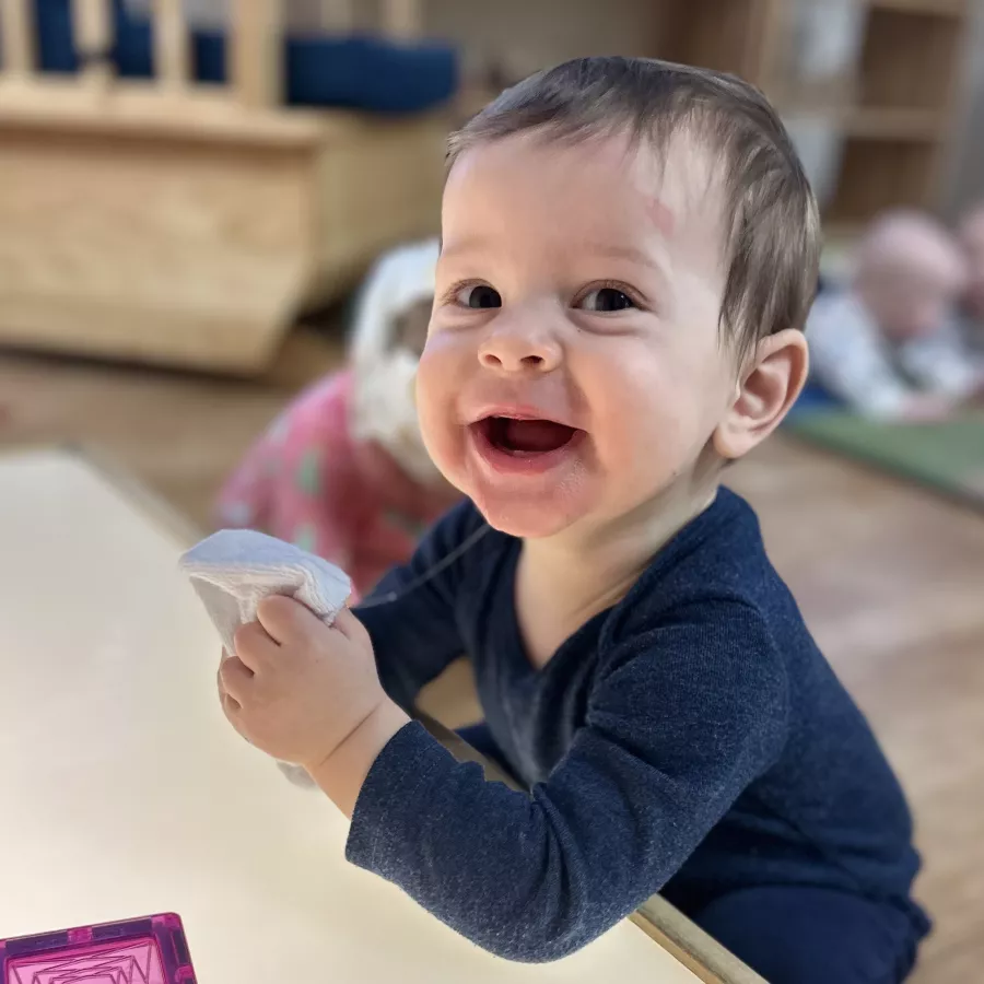 child playing with clay in our preschool in prospect