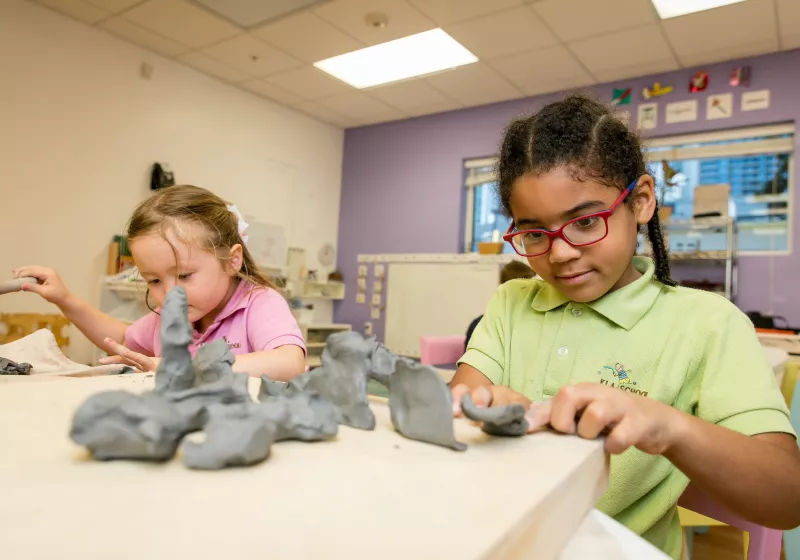 Preschool girls clay art