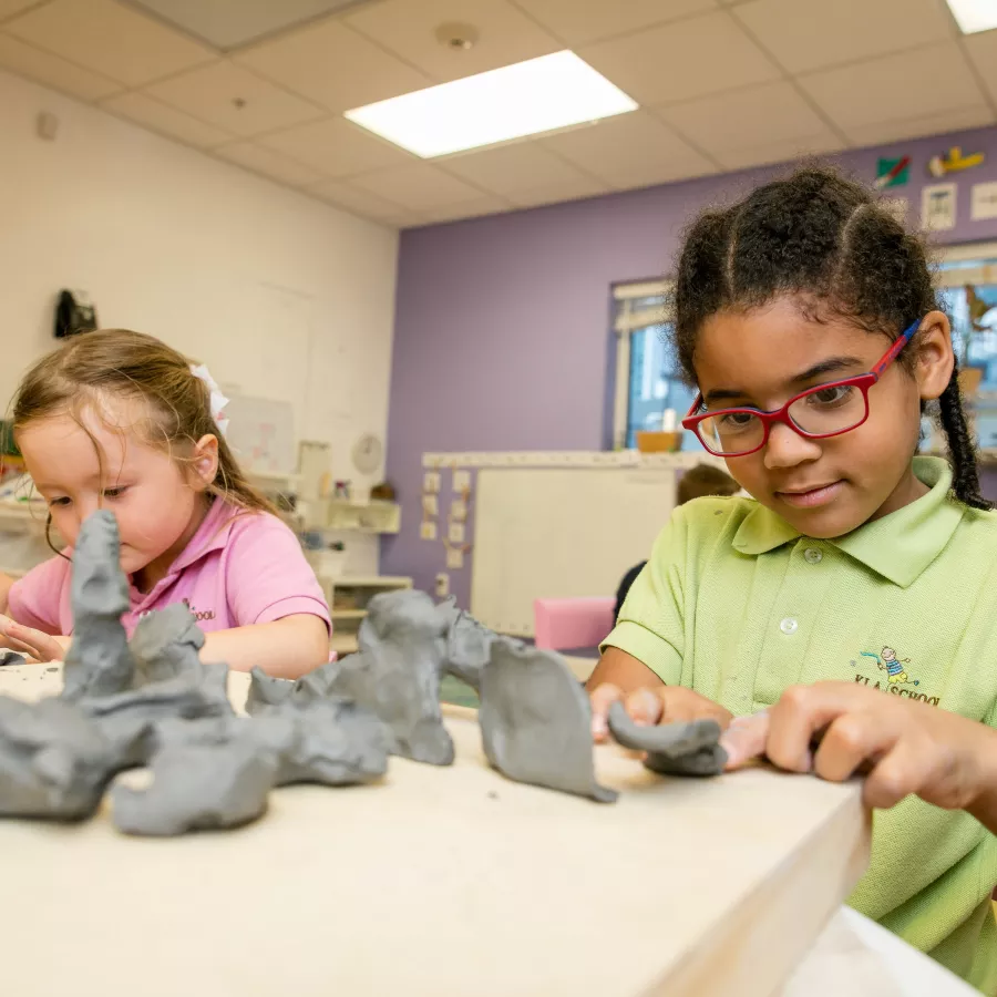 Preschool girls clay art