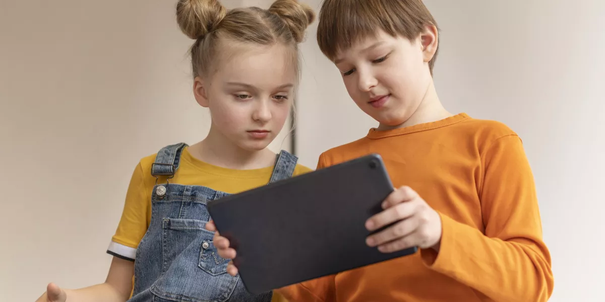 Low angle kids learning with devices