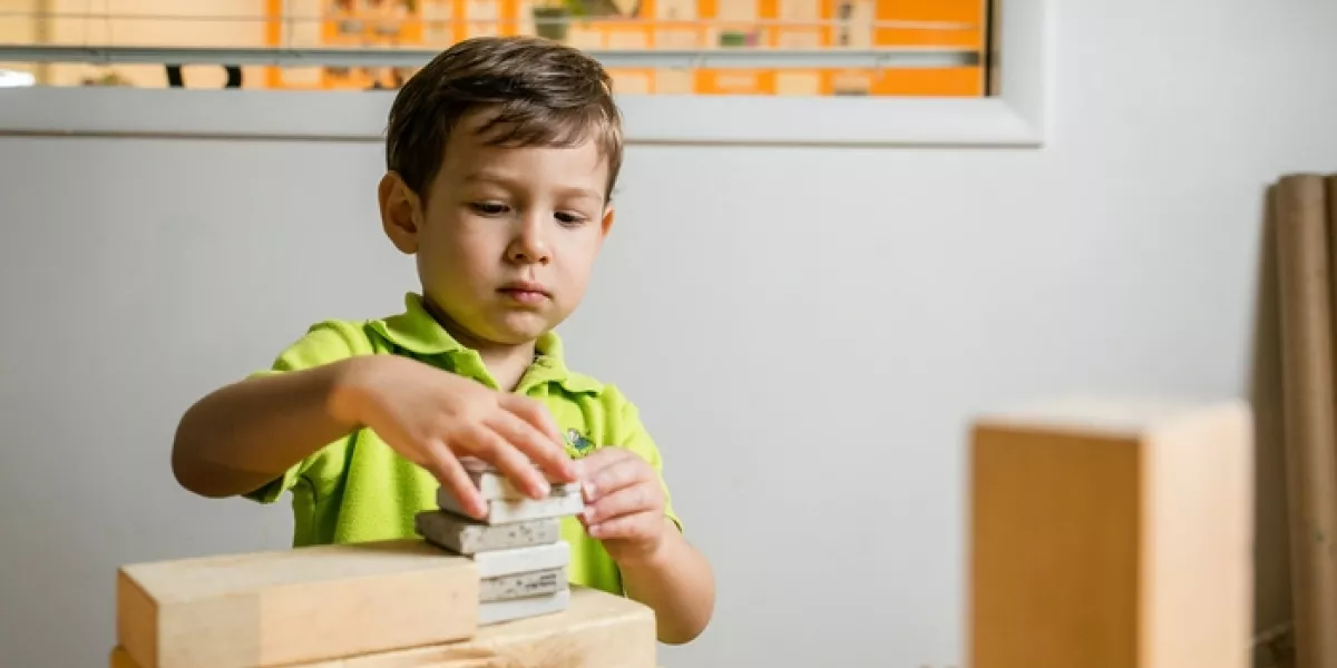 Blocks in classroom preschool student