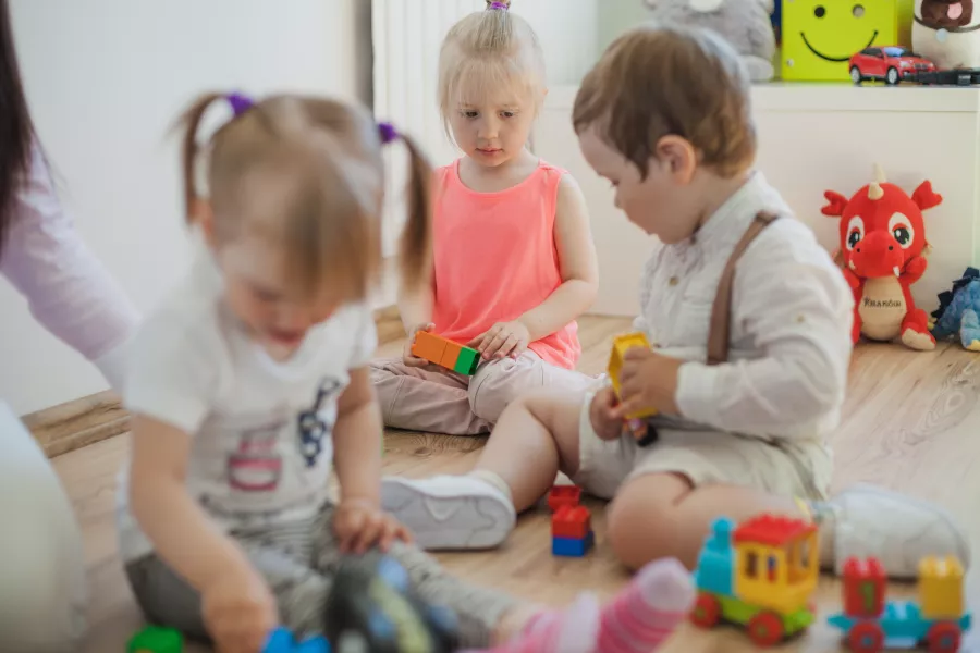 Group preschoolers playroom