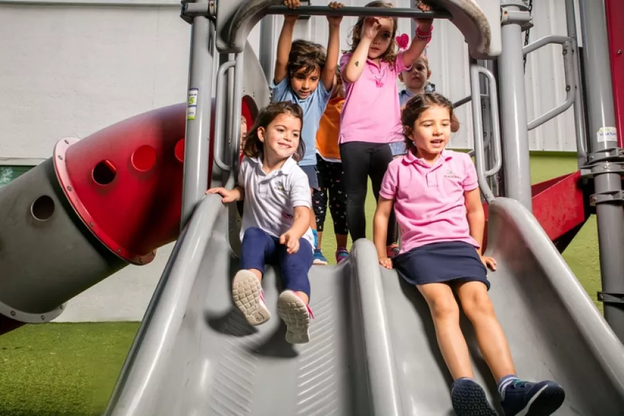 Preschool children on slide