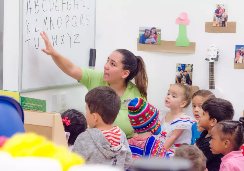 Preschool children learning alphabet