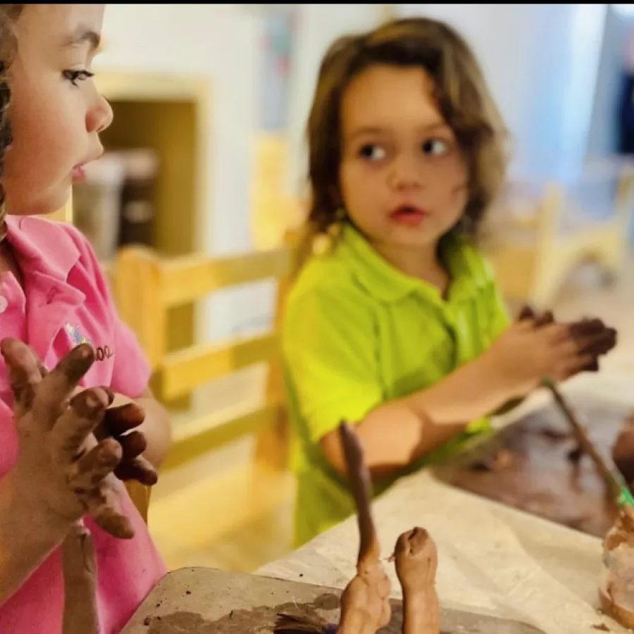Girls with clay