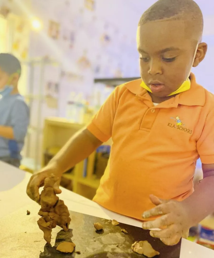 Boy with clay