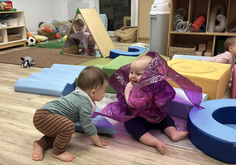 Infants exploring at KLA Coral Gables