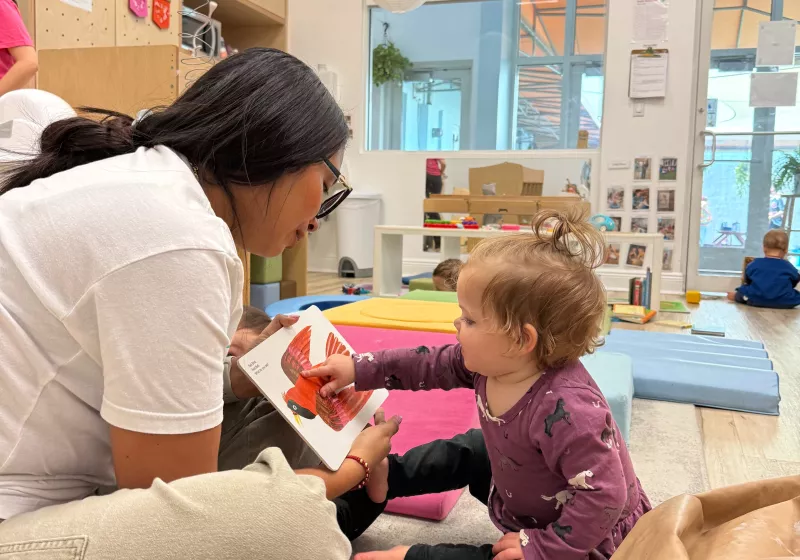 Baby and teacher at kla coral gables converted