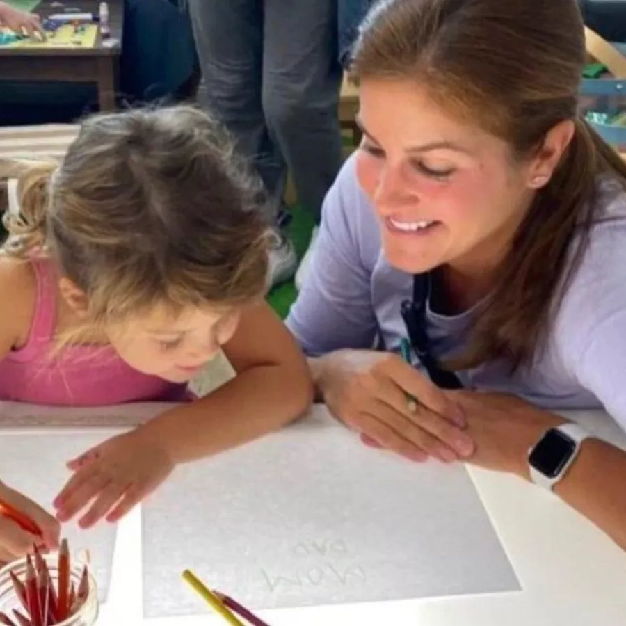 a female student engaged in activities in her classroom in our day care in coral gables fl