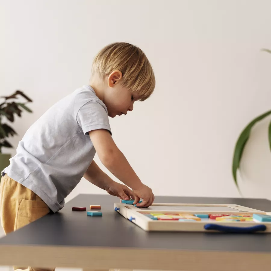 Medium shot kid playing with toys