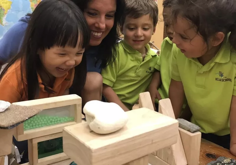 Teacher with children in classroom