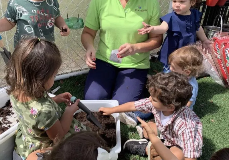 Children with Teacher outside