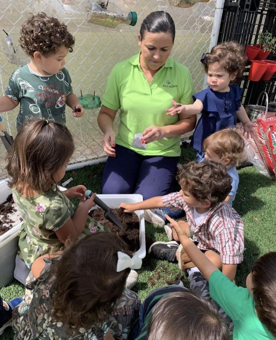 Children with Teacher outside
