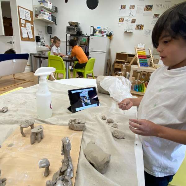 Boy clay and Ipad