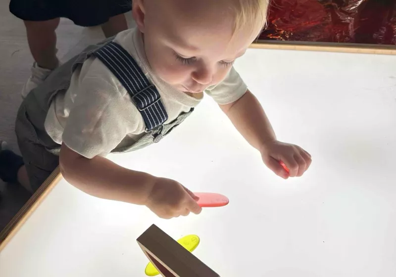 Baby at light table