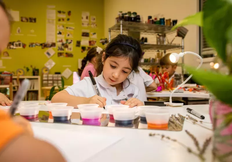 Preschool girl drawing
